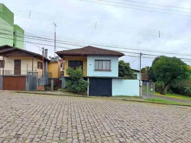 Terreno urbano, com área de 330,00 m², contendo um PRÉDIO DE ALVENARIA com dois pavimentos, sito à AVENIDA HÉRCULES, n° 1575, Caxias do Sul