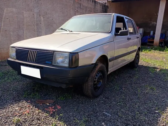 FIAT UNO MILLE ELECTRONI; 1993/1993; CINZA; GASOLINA - FUNCIONANDO