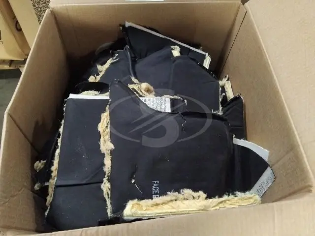 APROXIMADAMENTE 2.800 KG DE COLETES BALÍSTICOS E CAPAS DESTRUÍDAS